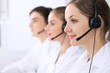 © rogerphoto - Call center. Focus on beautiful woman in headset