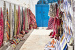 yard with carpets and blue door in Tunisia