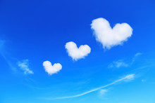Three White Heart Shaped Clouds On Blue Sky,love Concept