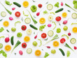 Vegetables and fruits on a white background. Pattern of vegetables and fruits. Food background. Collage of food. Top view.  Composition of pears, green peppers, cucumbers, green radish, tomatoes, gree