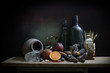 Objects expired and dried and rotten fruits on the plank in dim light night / Still life style  and select focus .