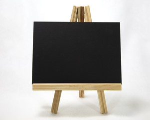 Wall Mural - Easel with blank black card. Copy space.