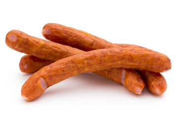 Wall Mural - Stack of smoked sausages isolated on a white background.