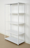 Fototapeta  - white metal rack near the wall, empty shelves