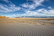 Sand Dunes In Mountain Valley