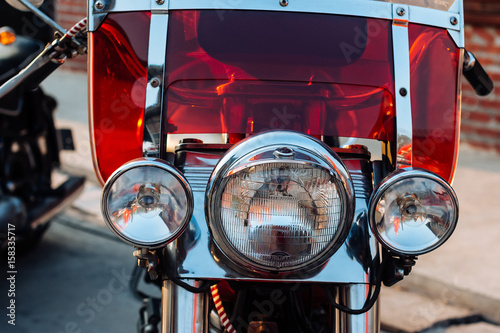 Close-up view on retro motorcycle headlights. Obraz na płótnie