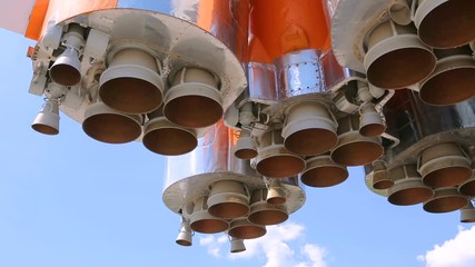 Wall Mural - space rocket engines of the russian spacecraft over blue sky background