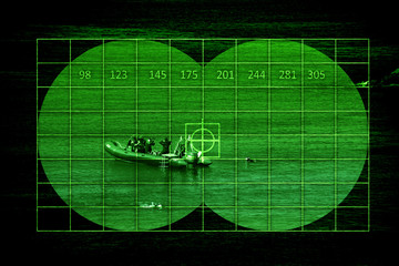 Wall Mural - Scuba divers on boat through night vision