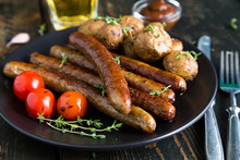 Fried Sausages With Baked Potatoes