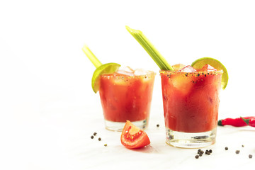 Wall Mural - Bloody Mary cocktails with celery and lime