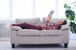 © ArtFamily - Graceful girl having rest while reading book
