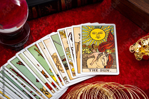 Cuadros en Lienzo Fortune teller and whitcraft concept with tarot cards spread on red velvet surro