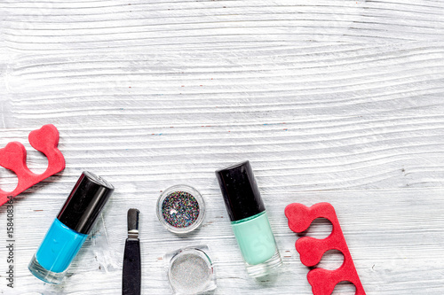 Download Manicure Set And Nail Polish For Hands Treatment On Gray Wooden Background Top View Mockup Stock Photo Adobe Stock