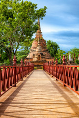 Wall Mural - Amazing bridge to Wat Sa Si (temple) in Sukhothai Historical Park, Thailand. Unesco World Heritage Site