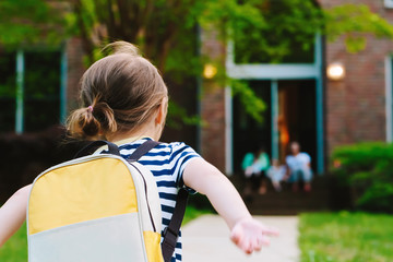 Wall Mural - Happy Toddler girl arriving home from school