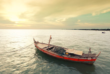 Old Fishing Boat On The Sea Coast Of Thailand.