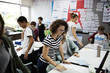© Rawpixel.com - Group of students learning in classroom