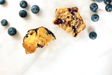 Two Halves Of Blueberry Muffin With Fresh Berries And Copyspace