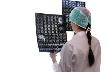 Wall Mural - Doctor holding a picture of a brain MRI