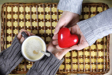 Wall Mural - man presents girl drinks coffee gift on Valentine's Day