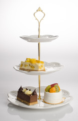 Wall Mural - tray or three tier serving tray with dessert.