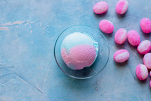 Blue And Pink Bubble Gum Ice Cream With Sweet Candy Cane And Mint On Concrete Blue Table Background.