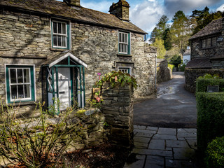 Wall Mural - Grasmere, Cumbria, England. Traditional slate cottages in the English Lake District town of Grasmere known as the home of poet William Wordsworth.