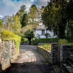 Wall Mural - Grasmere, Cumbria, England. Traditional cottages in the rural English Lake District town known as the home of poet William Wordsworth.