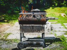 Burning And Preheating Old Rusty Barbecue Grill Cleaning Dirty Grid.