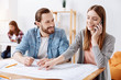 © Viacheslav Yakobchuk - Easygoing emotional girl discussing details of the project with client
