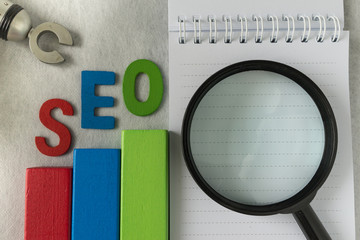 Aufkleber - search engine optimization concept as colorful wooden block as analysis chart with alphabet abbrevia