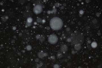 snow on a black background texture overlay bokeh highlights