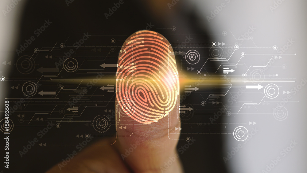 Businessman login with fingerprint scanning technology. fingerprint to identify personal, security system concept - obrazy, fototapety, plakaty 