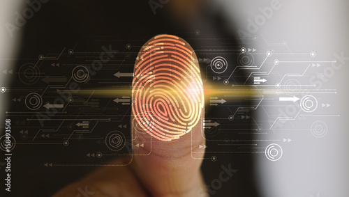 Fotografía Businessman login with fingerprint scanning technology