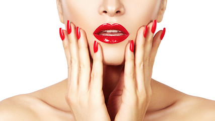 Red lips and bright manicured nails. Sexy open mouth. Beautiful manicure and makeup. Celebrate make up and clean skin