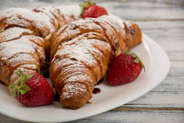 Wall Mural - Croissant with strawberries