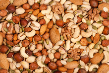 Mix Of Different Nuts As Background Close-up