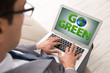 © Elnur - Businessman with laptop in green environment concept