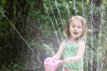 Little Girl Playing In Sprinkler Free Stock Photo - Public Domain Pictures