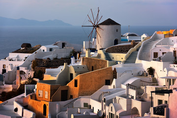 Fototapete - Windmills of Oia Village at Sunset, Santorini, Greece