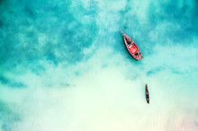 Boat And Ship In Beautiful Turquoise Ocean Near An Island, Top View, Aerial Photo
