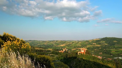 Canvas Print - clouds on Brisighella, medieval village in countryside