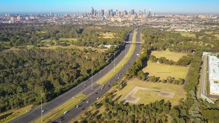 Poster - Aerial hyperlapse video of highway traffic and Melbourne city CBD