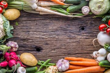 Wall Mural - Vegetable. Assortment of fresh vegetable on rustic old oak table. Vegetable from market place.