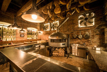 Rustic Pizza Oven, Bar And Kitchen In Pizzeria Interior