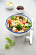 Pasta salad with vegetables and cheese. Concept of healthy eating, vegan food 