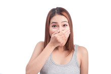 Young Adult Asian Woman Holding Hand Over Her Mouth Over White Background
