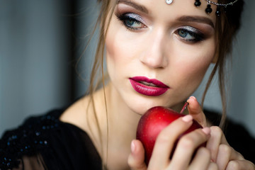 Portrait of a beautiful girl in a black negligee