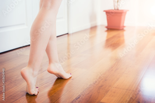 Floor Heating Young Woman Walking In The House On The Warm Floor