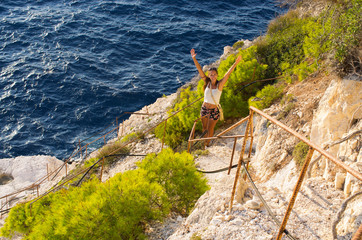 Sticker - Woman on cliff of Zakynthos island - Agalas, Greece